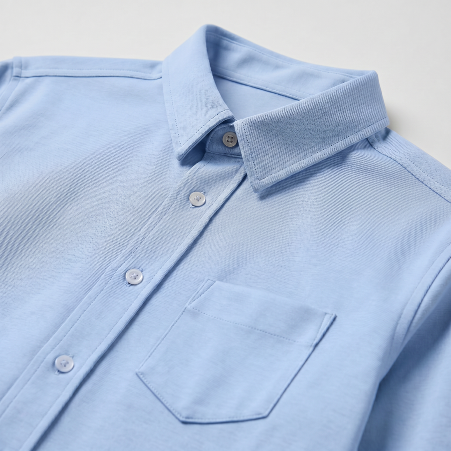The Flydays shirt: soft white technical fabric with no stiff collar, underarm gusset shown